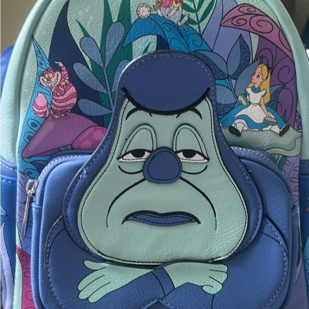 Loungefly Blue and Purple Wonderland Backpack